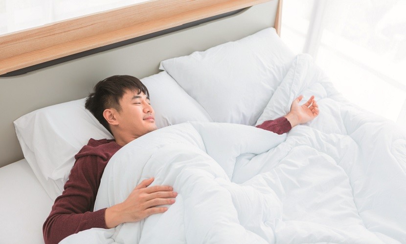 下背不舒服該仰睡還是側睡?